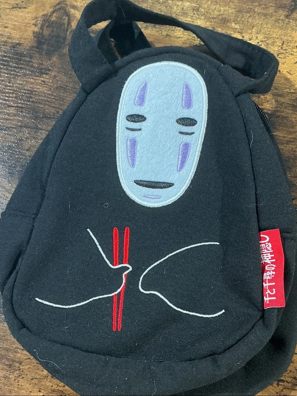 Spirited Away No-Face character and chopsticks